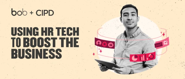 using-hr-tech-to-boost-business, man-holding-tablet-illustrated-graphics-representing-hr-technology