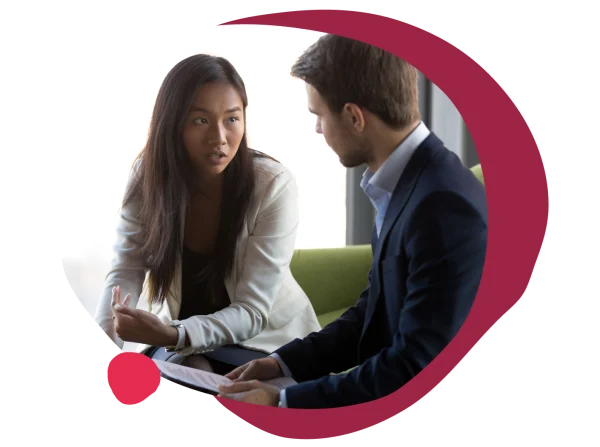 business meeting, vibrant conversation between two professionals in modern office setting