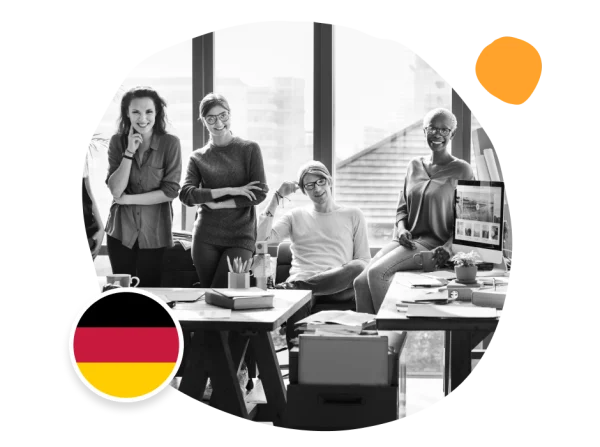 team workspace, German flag in creative office with diverse professionals smiling and collaborating