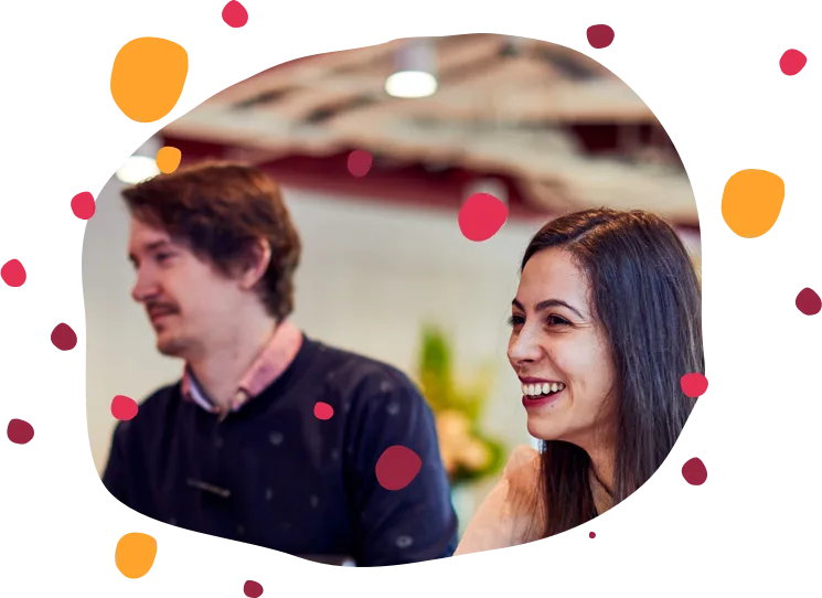 people enjoying conversation, modern workspace with colorful accents