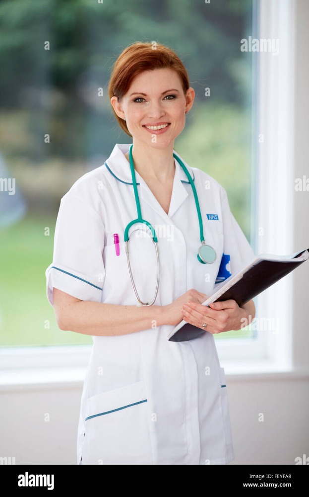 portrait-of-nurse-smiling-FEYFA8.jpg