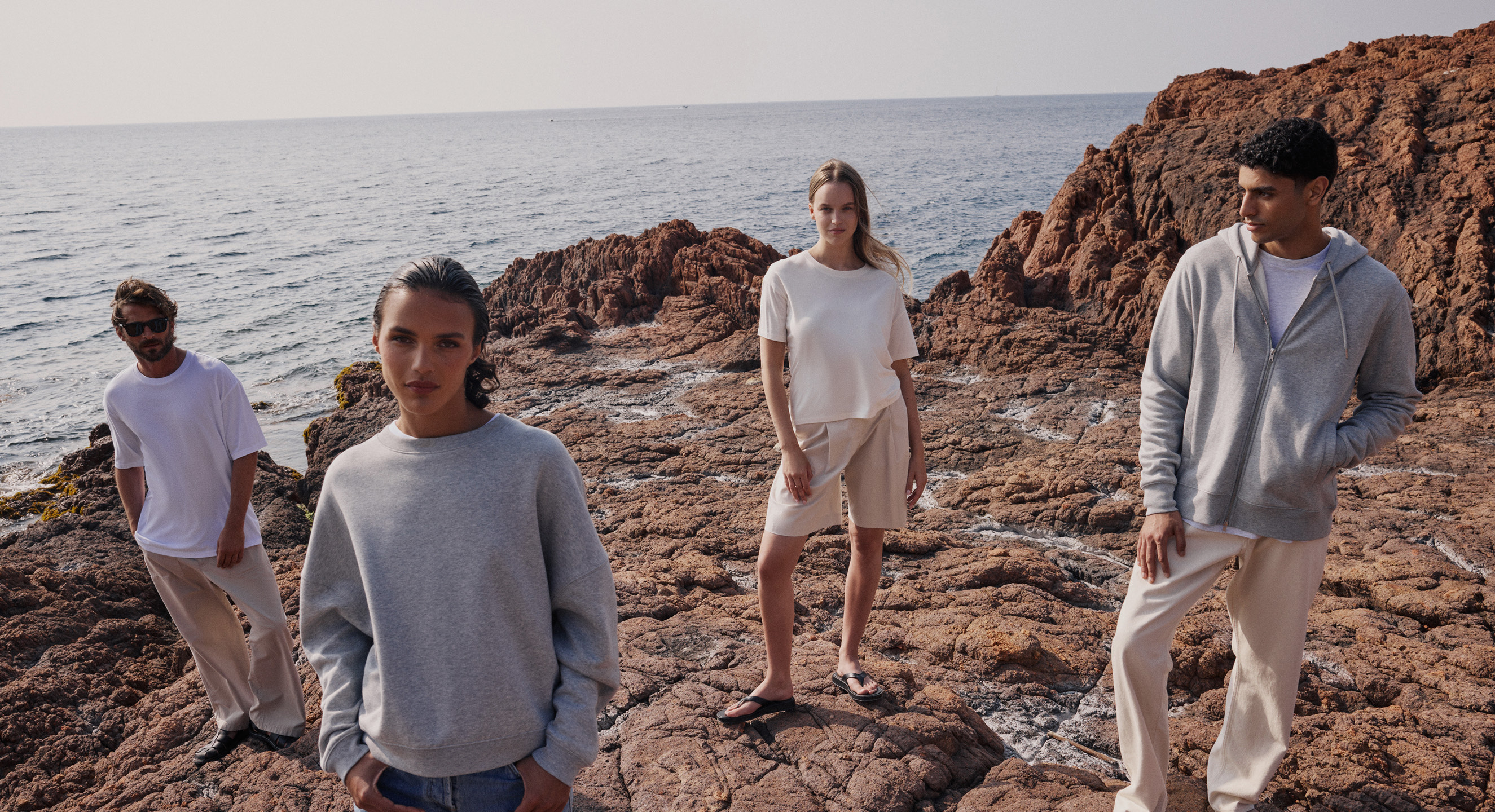 Models wearing new SS26 designs, including t-shirts and a Harper shirt