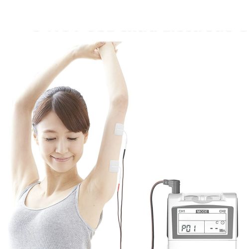 Med-Fit Combined Dual Channel Tens & Muscle Stimulator being operated by a woman with electrodes on the underside of her arm