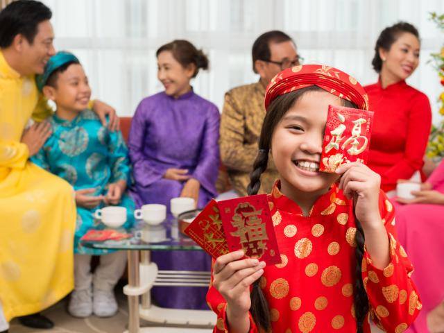 Why do adults give Li Xi to children?