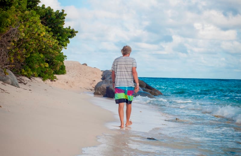 Richard Branson walking on the beach