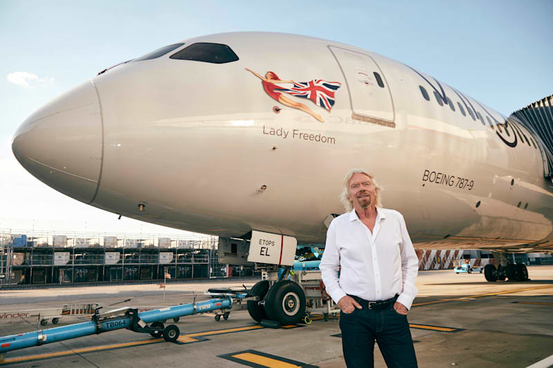 Richard Branson standing in front of Virgin Atlantic's Boeing 787-9, Freedom Lady