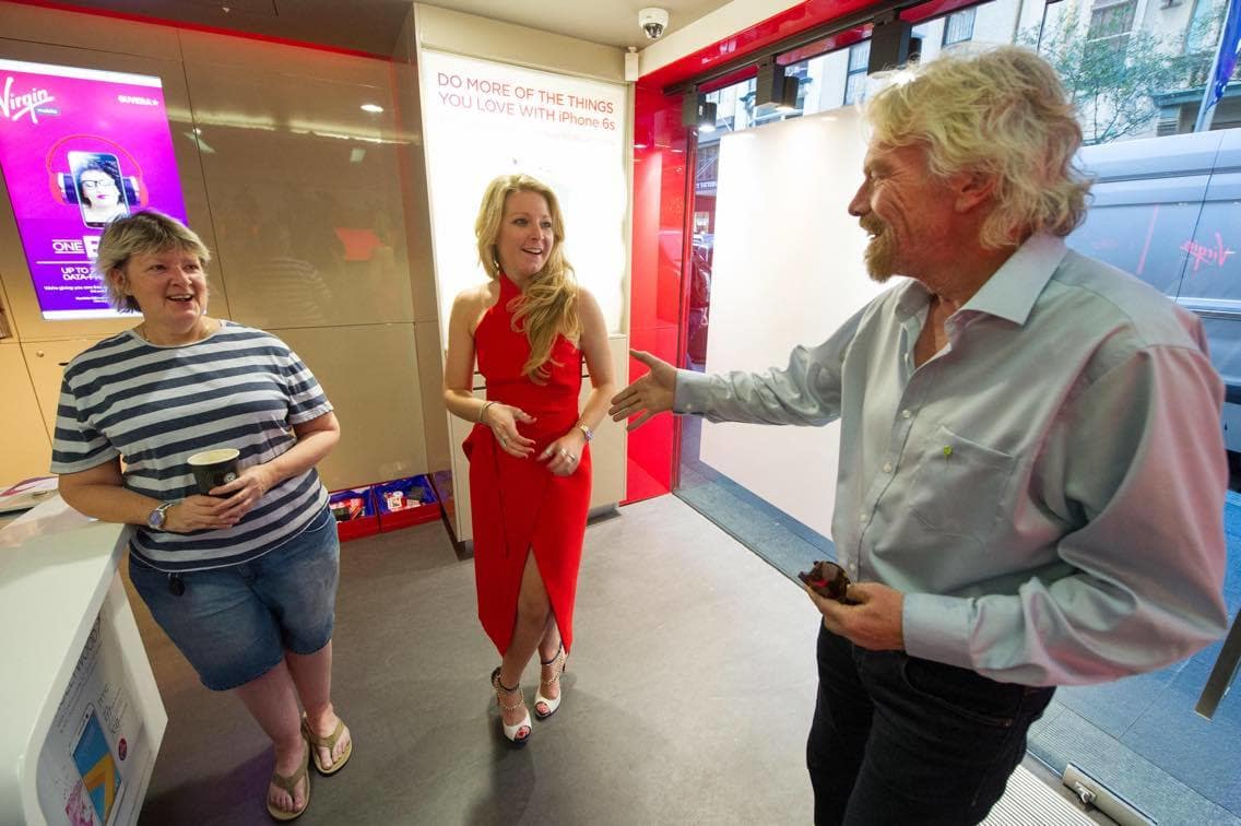 Richard Branson surprises two Virgin Mobile Australia customers in Sydney Richard Branson surprises two Virgin Mobile Australia customers in Sydney