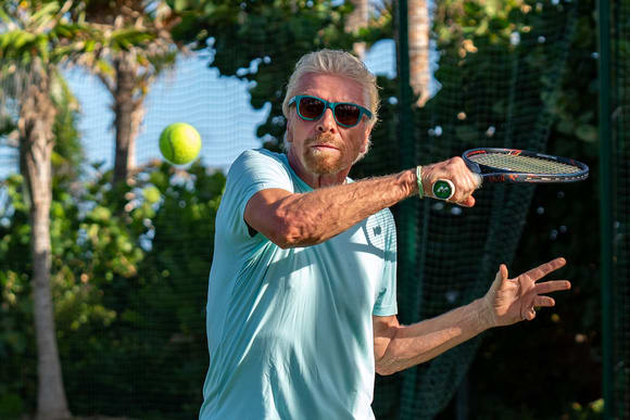 Richard Branson playing tennis Richard Branson playing tennis