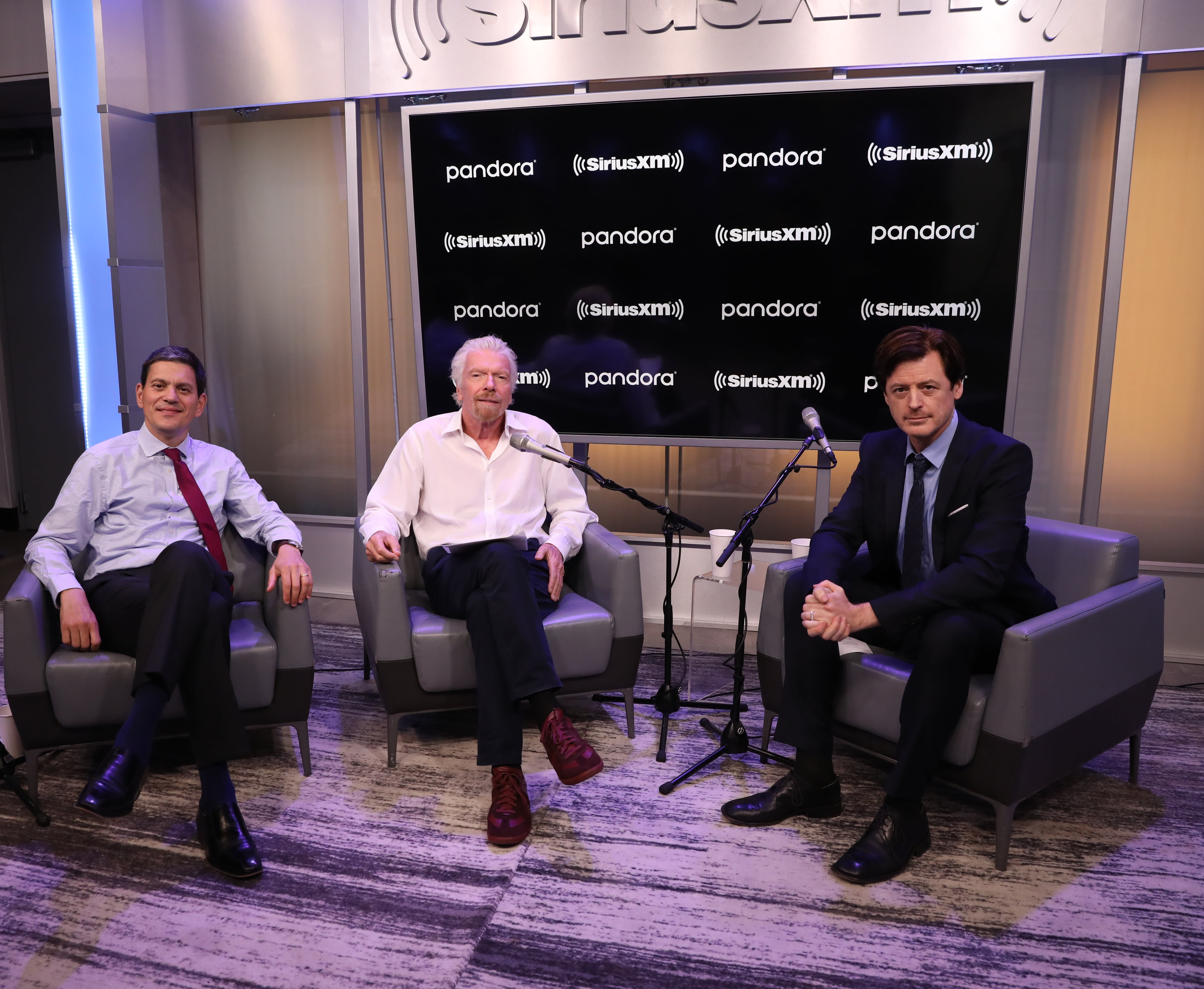 Richard Branson, David Miliband and John Fugelsang Richard Branson, David Miliband and John Fugelsang