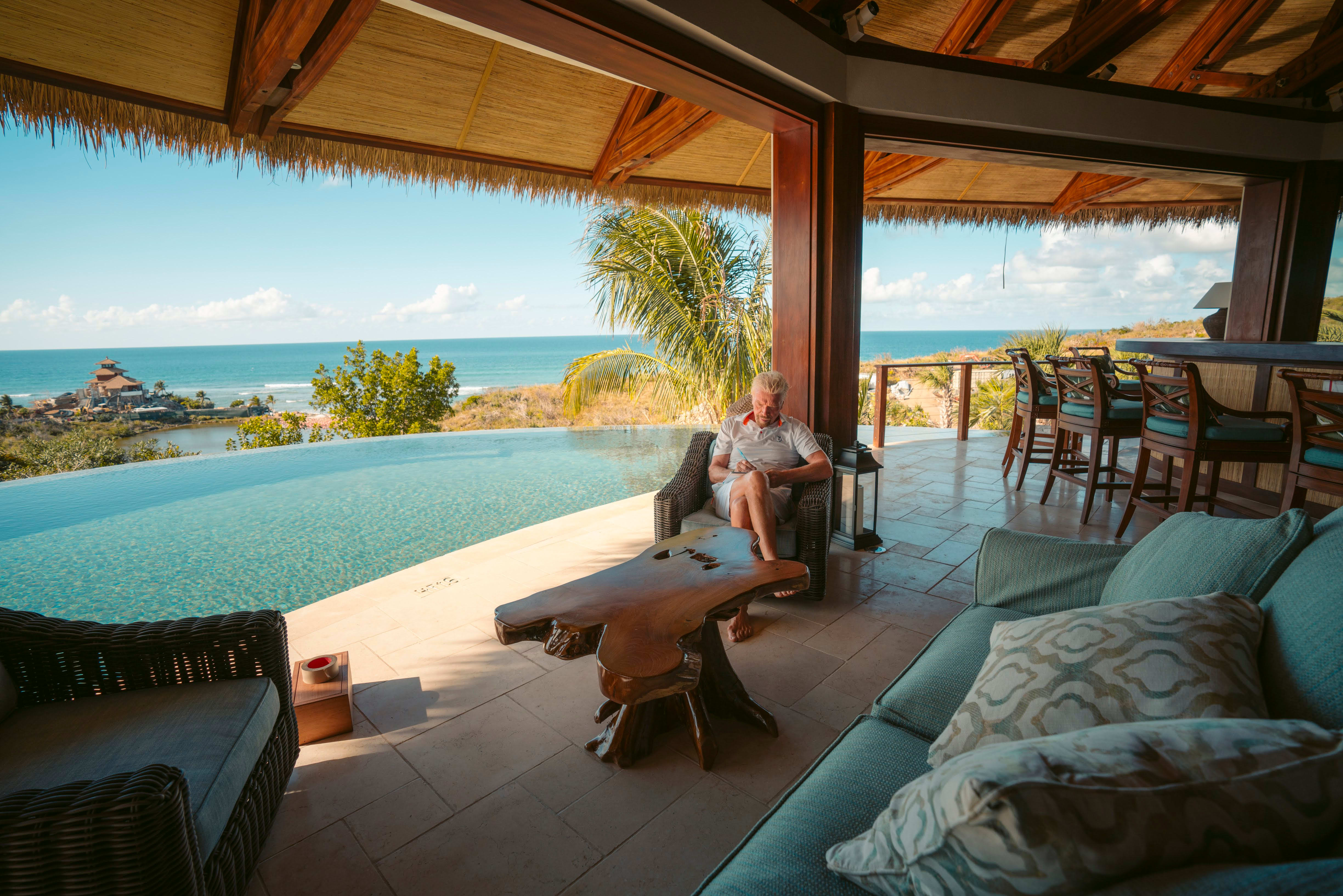 Richard Branson working on Necker Island Richard Branson working on Necker Island
