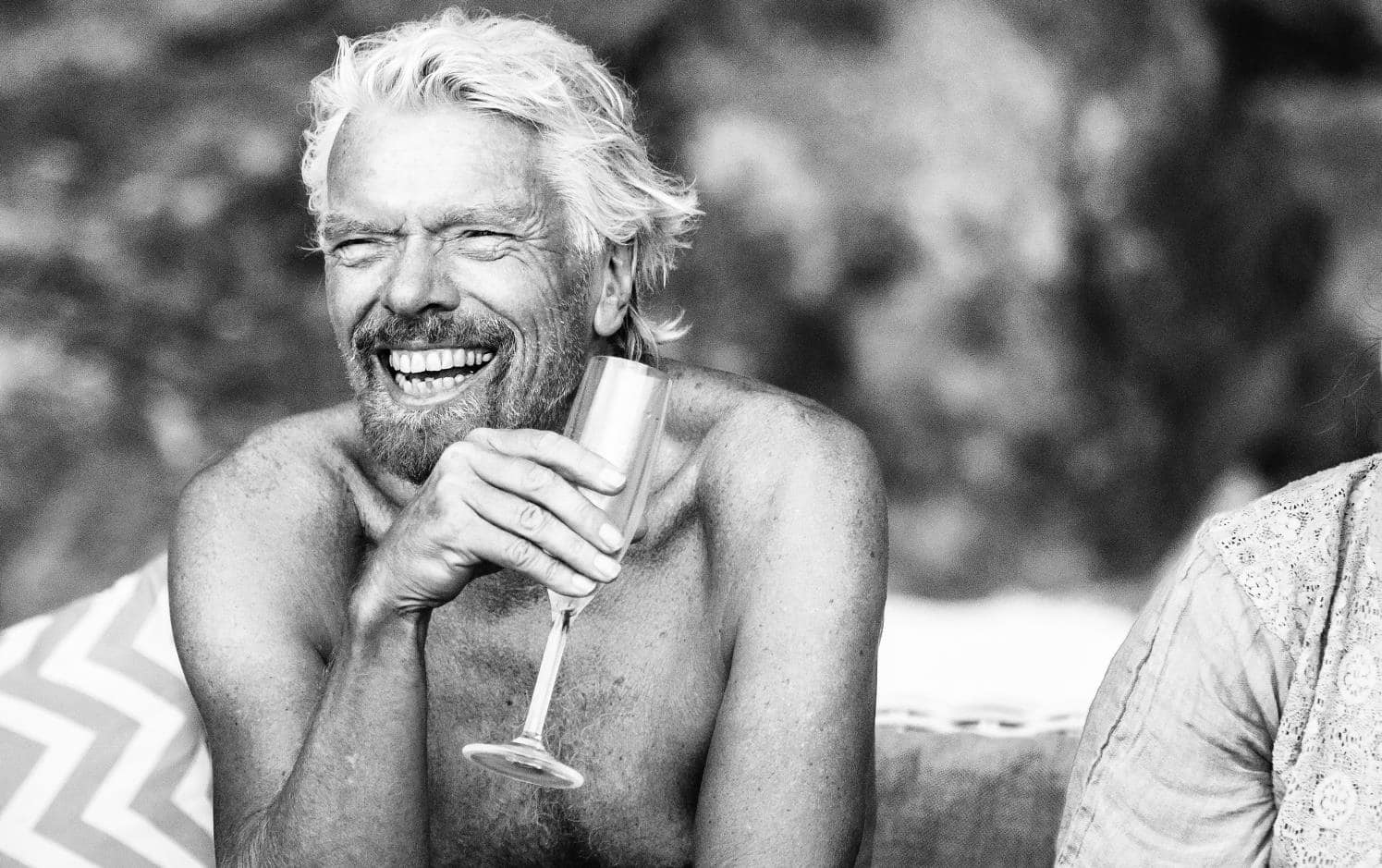 Richard Branson enjoying a drink Richard Branson enjoying a drink
