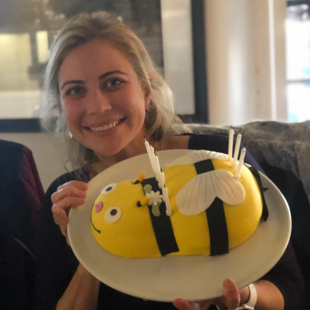 Holly Branson bee cake Holly Branson holds a birthday bee cake
