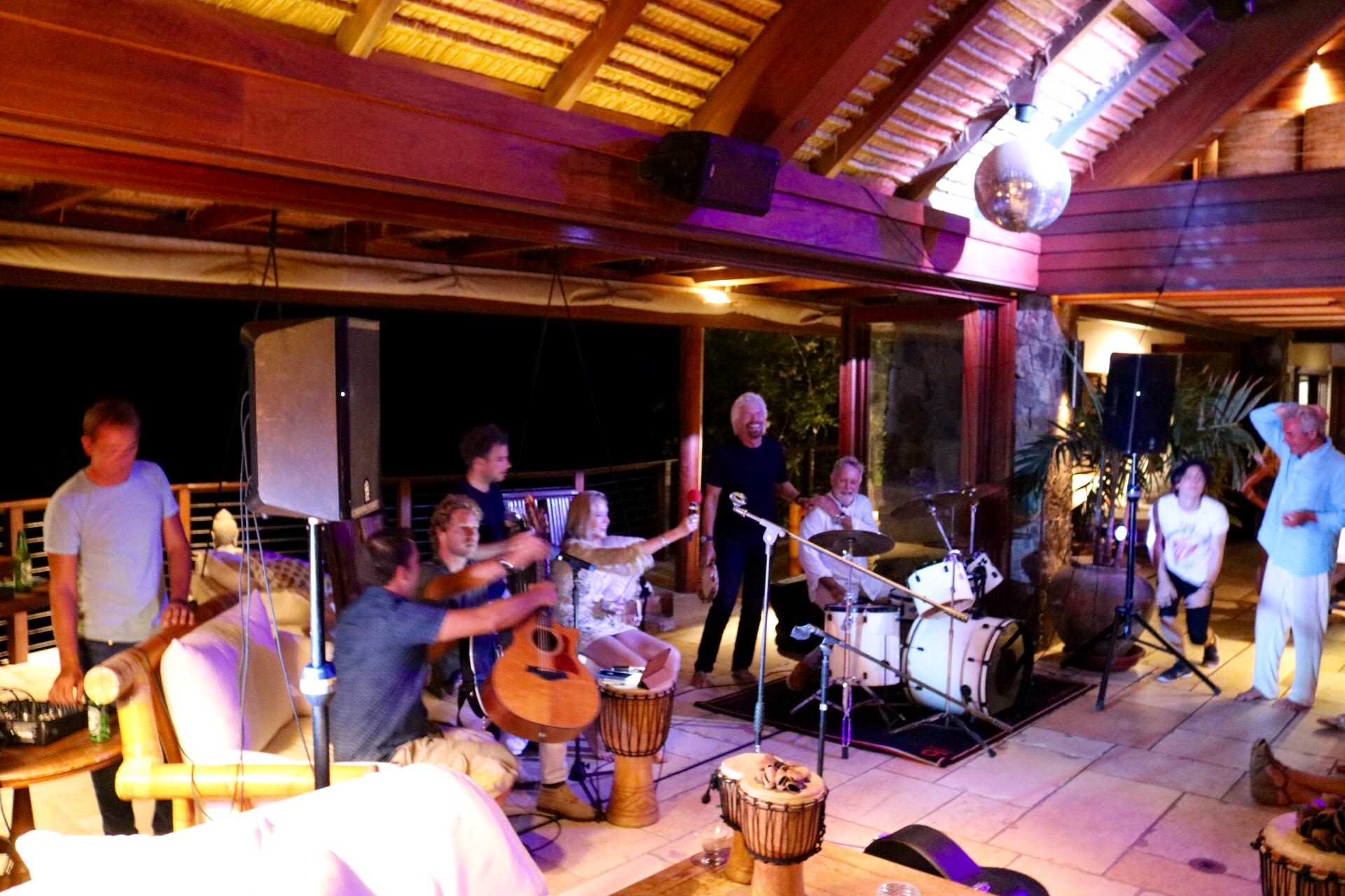 Richard Branson and Sam Branson jamming with Roger Taylor Richard Branson and Sam Branson jamming with Roger Taylor