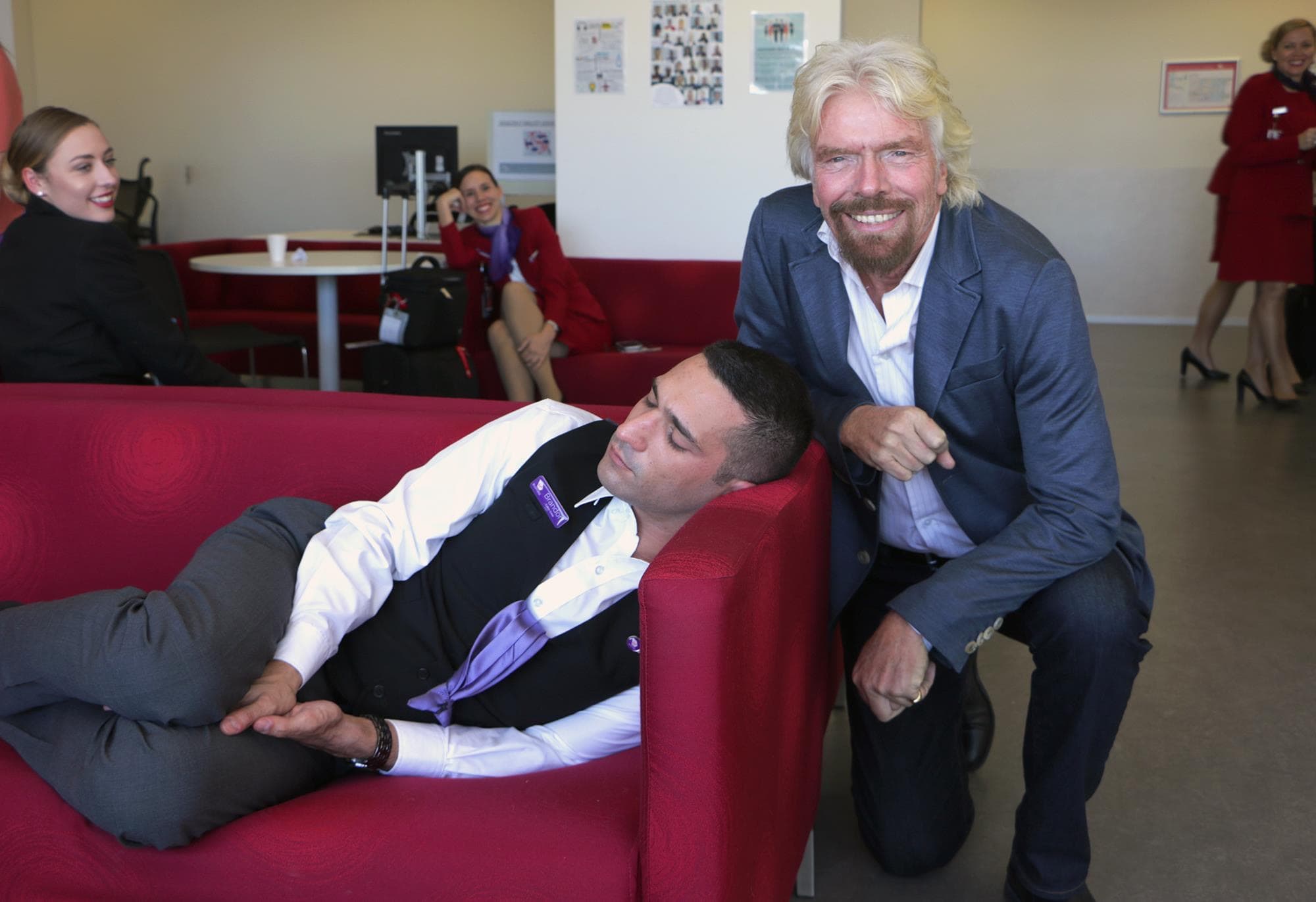 Richard Branson and Virgin Australia sleeping team member Richard Branson and Virgin Australia sleeping team member