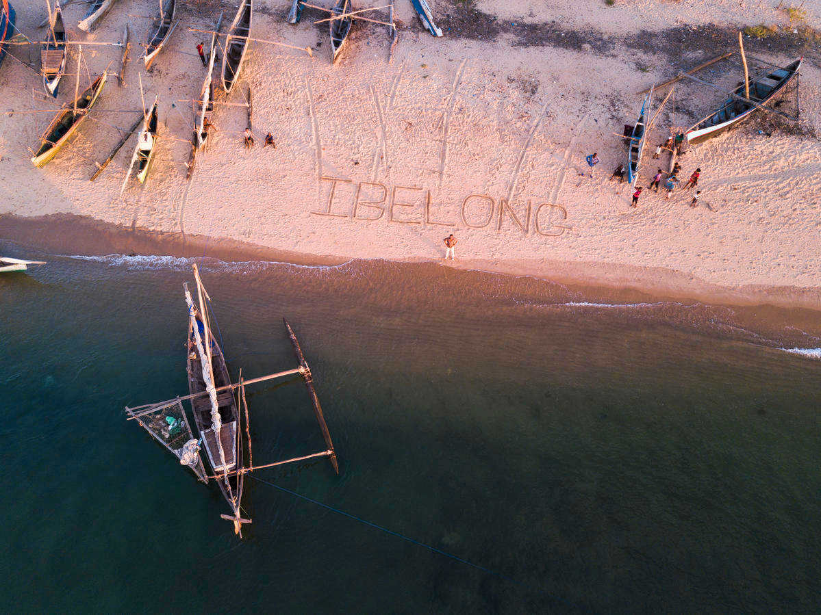 A beach in the port town of Mahajanga, Madagascar where some of the early Karana community settled from India, displays the words of UNHCR's #IBelong campaign, highlighting global statelesness. A beach in the port town of Mahajanga, Madagascar where some of the early Karana community settled from India, displays the words of UNHCR's #IBelong campaign, highlighting global statelesness.