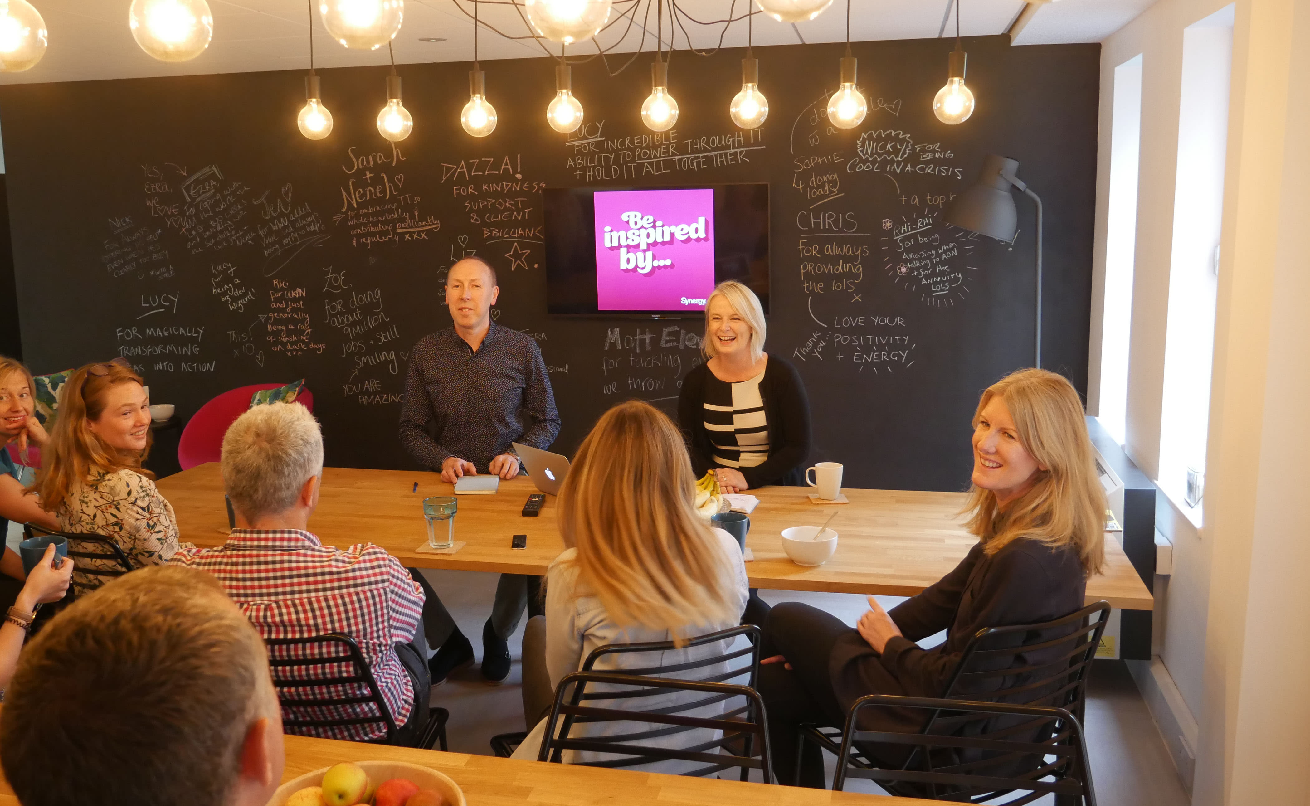 Gemma McGrattan (centre) hosts Synergy Creative’s weekly all-company meeting Gemma McGrattan (centre) hosts Synergy Creative’s weekly all-company meeting