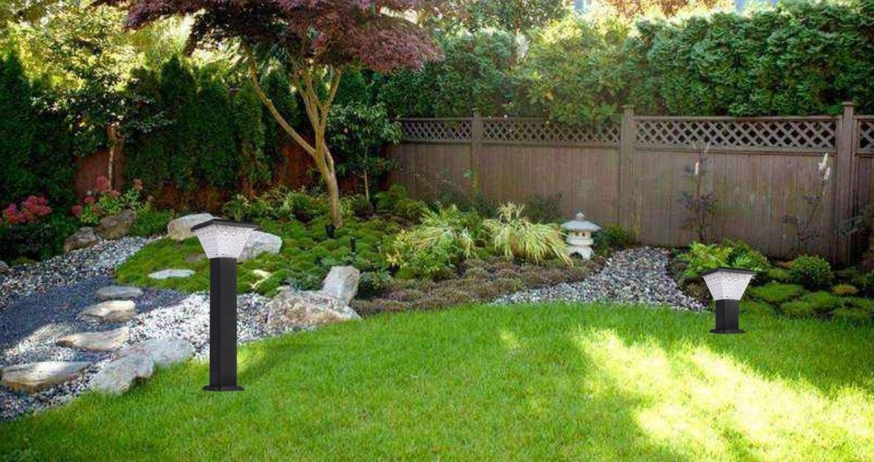 Solar LED garden lights installed along a garden pathway