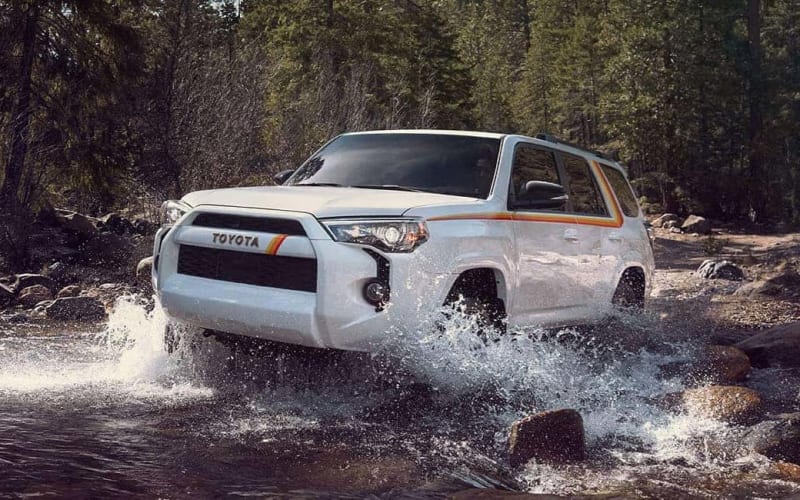 Toyota 4Runner crossing a creek