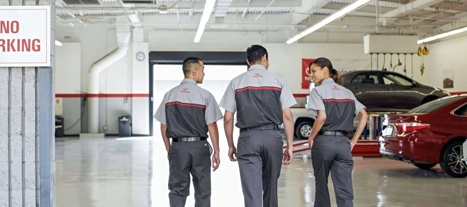 Technicians walking the service floor at Germain Toyota of Naples
