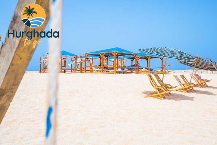 Sandy beach beside clear turquoise Red Sea water Sandy beach beside clear turquoise Red Sea water