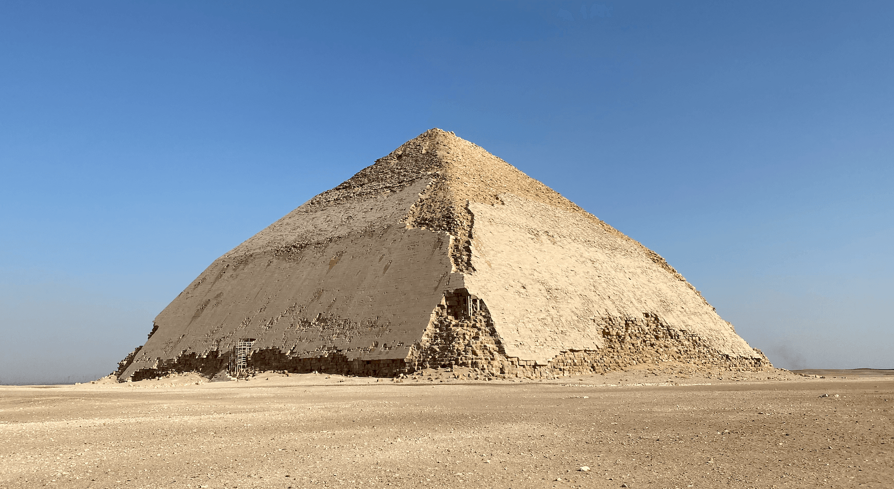Giza pyramids and the Great Sphinx in the desert Giza pyramids and Sphinx in the Egyptian desert