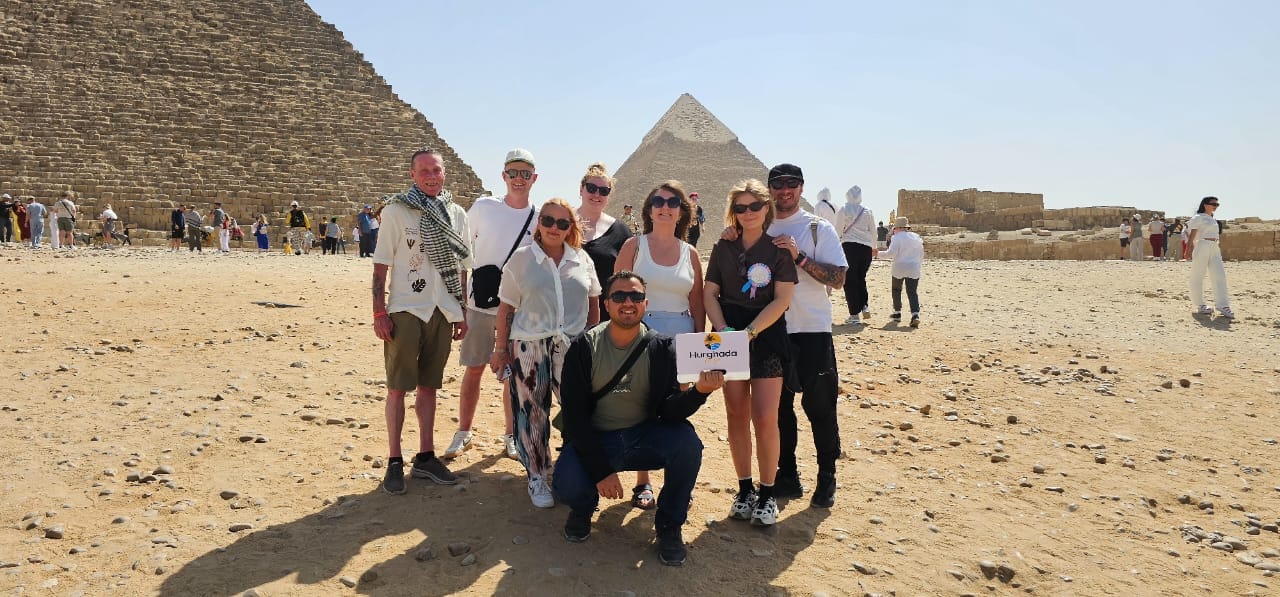 Giza pyramids and the Great Sphinx in the desert Giza pyramids and Sphinx in the Egyptian desert