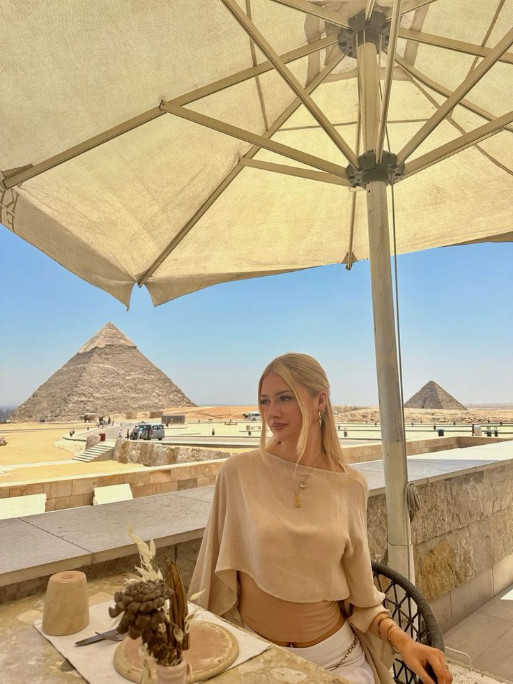 Giza pyramids and the Great Sphinx in the desert Giza pyramids and Sphinx in the Egyptian desert