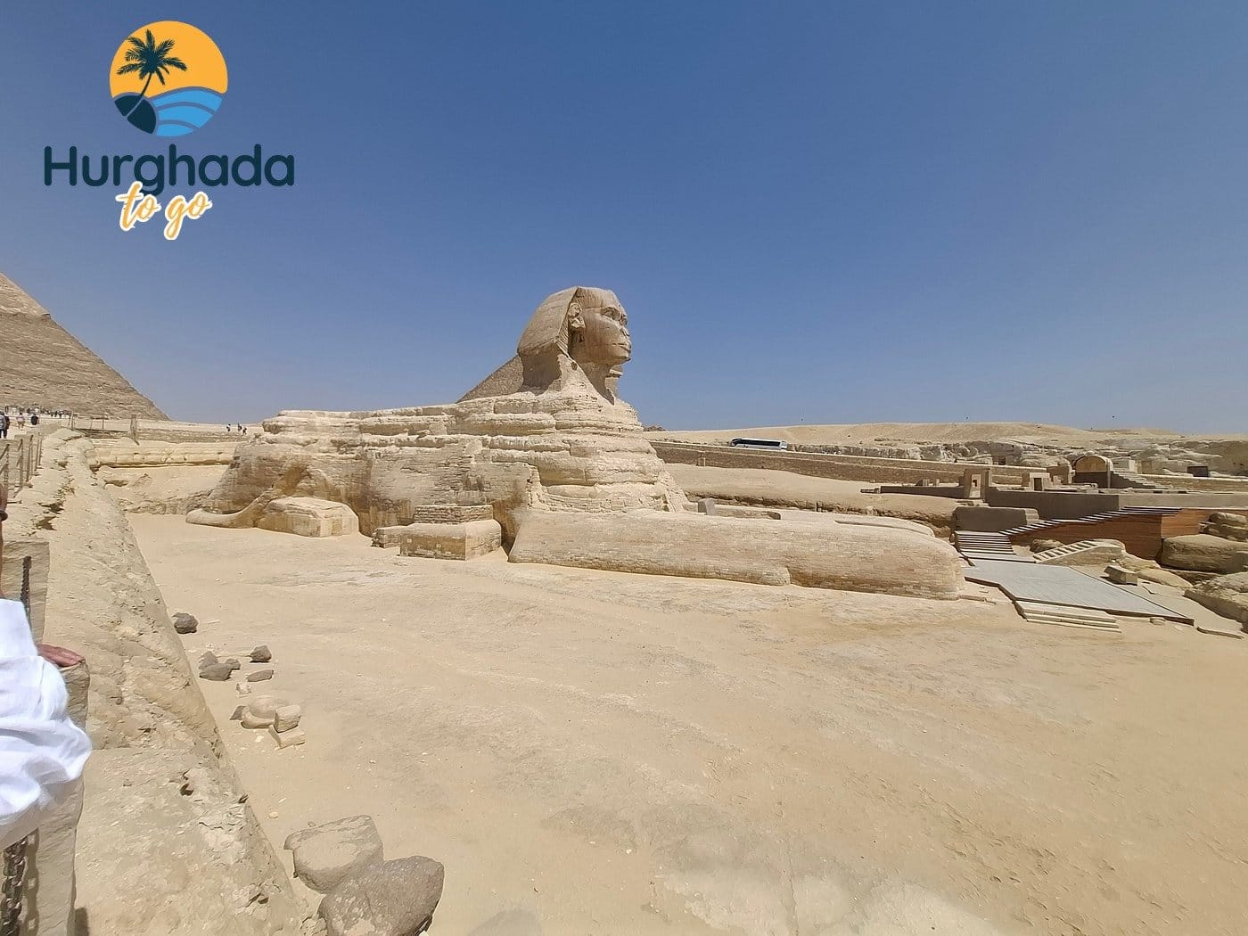Giza pyramids and the Great Sphinx in the desert Giza pyramids and Sphinx in the Egyptian desert