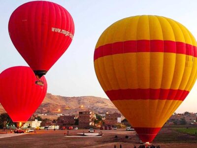 Hot-air balloons over the Nile Valley at sunrise