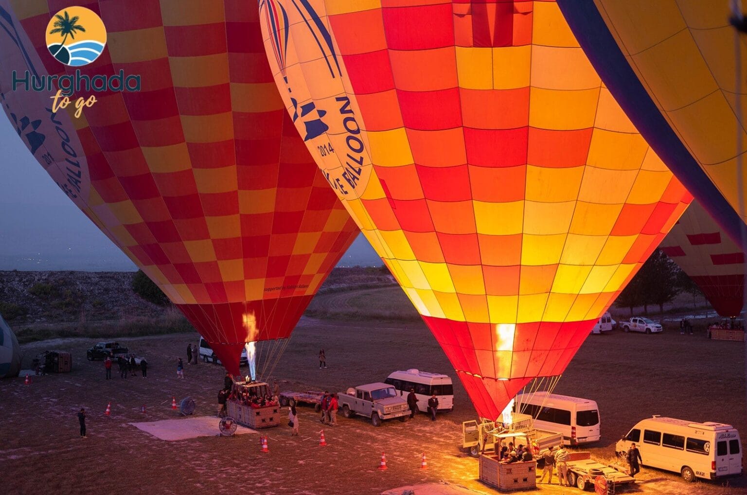 Hot-air balloons over Luxor at sunrise