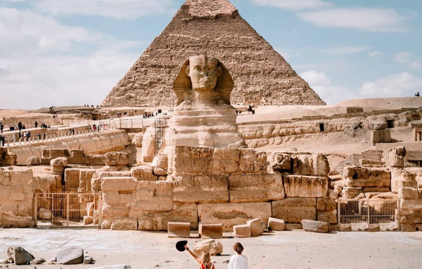 Giza pyramids and Sphinx in the Egyptian desert Giza pyramids and Sphinx in the Egyptian desert