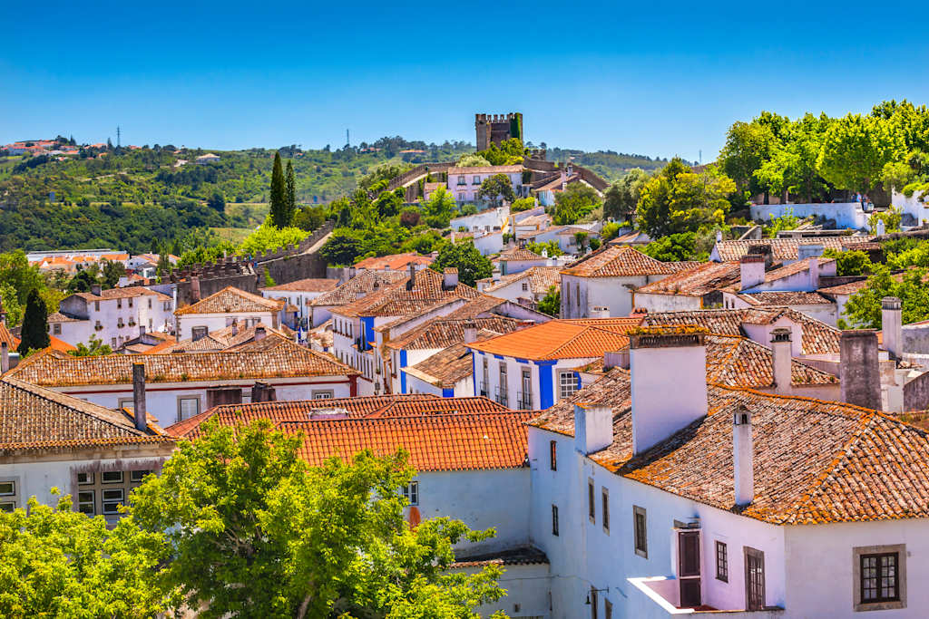 Castle Wals Turrets Towers Medieval Town Obidos Portugal. Castle and walls built in 11th century after town taken from the Moors.