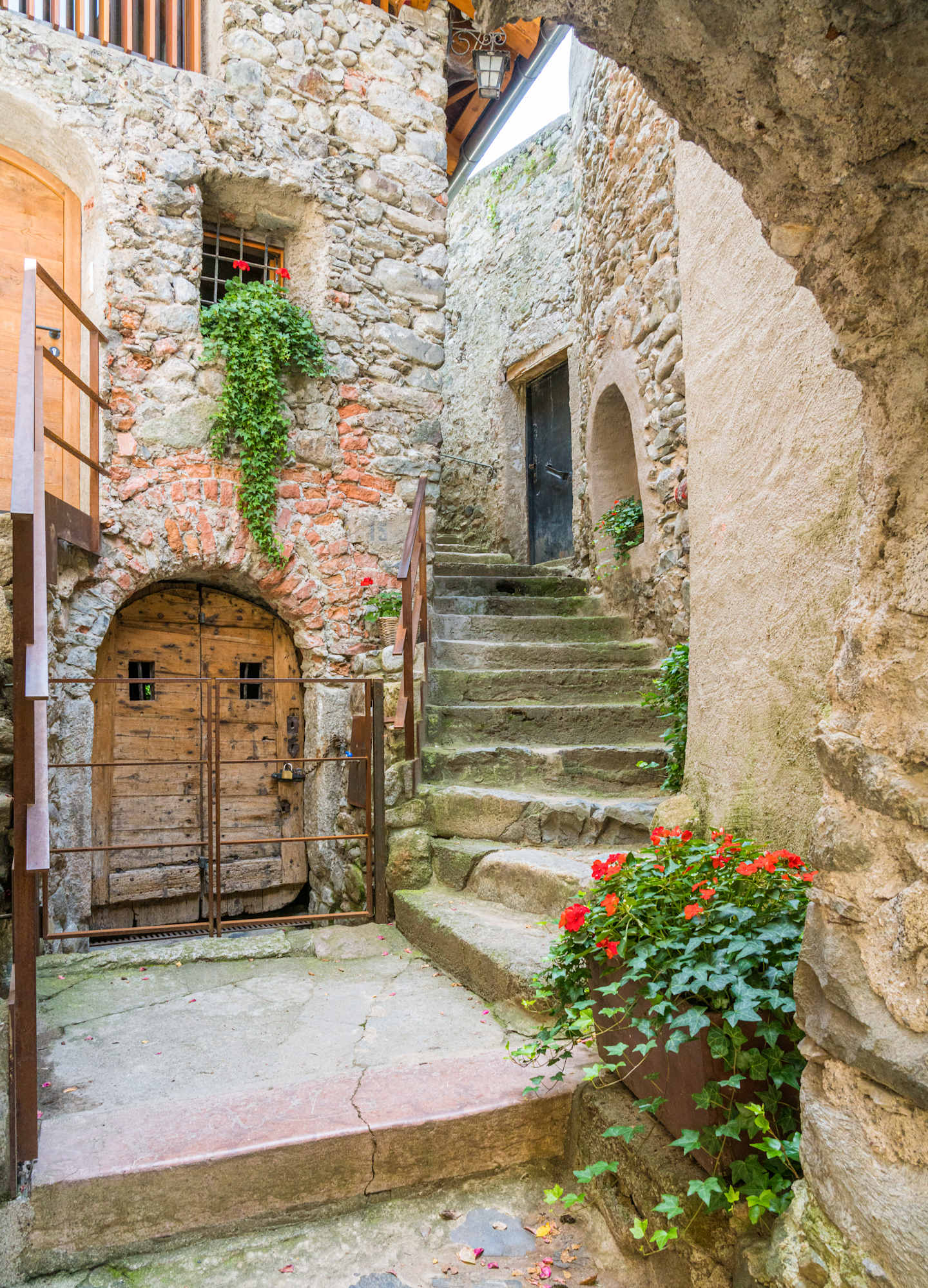 Colorful road in Chiusa on a summer day, picturesque town in the province of Bolzano. Trentino Alto Adige, Italy.