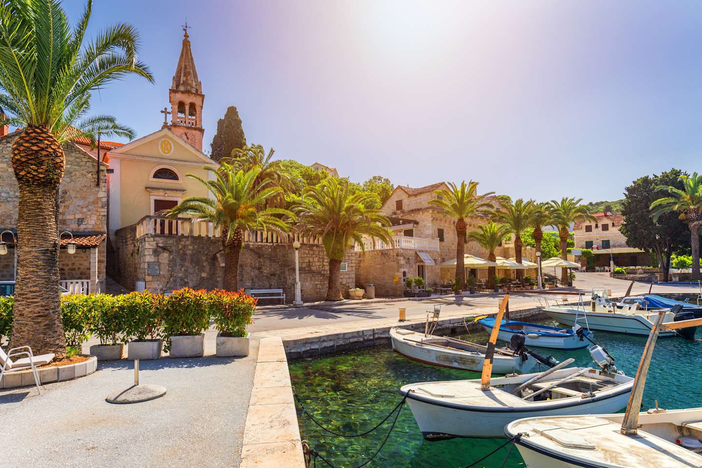 CRS pre-trip extension, fishing boats in Splitska village with beautiful port, Brac island, Croatia. Village of Splitska on Brac island seafront view, Dalmatia