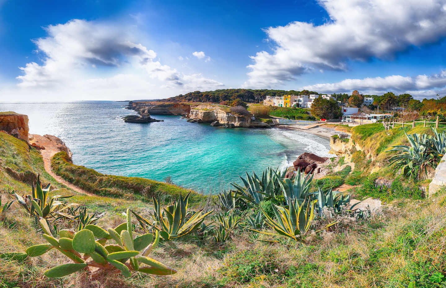 Beach Torre Sant'Andrea and islet Scoglio the Tafaluro, Otranto region, Salento Adriatic sea coast, Puglia, Italy