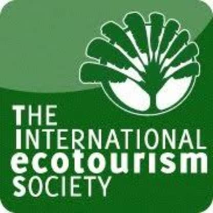 The image features a green background with a white tree-like symbol in the center, along with the text "THE INTERNATIONAL ECOTOURISM SOCIETY" below it.