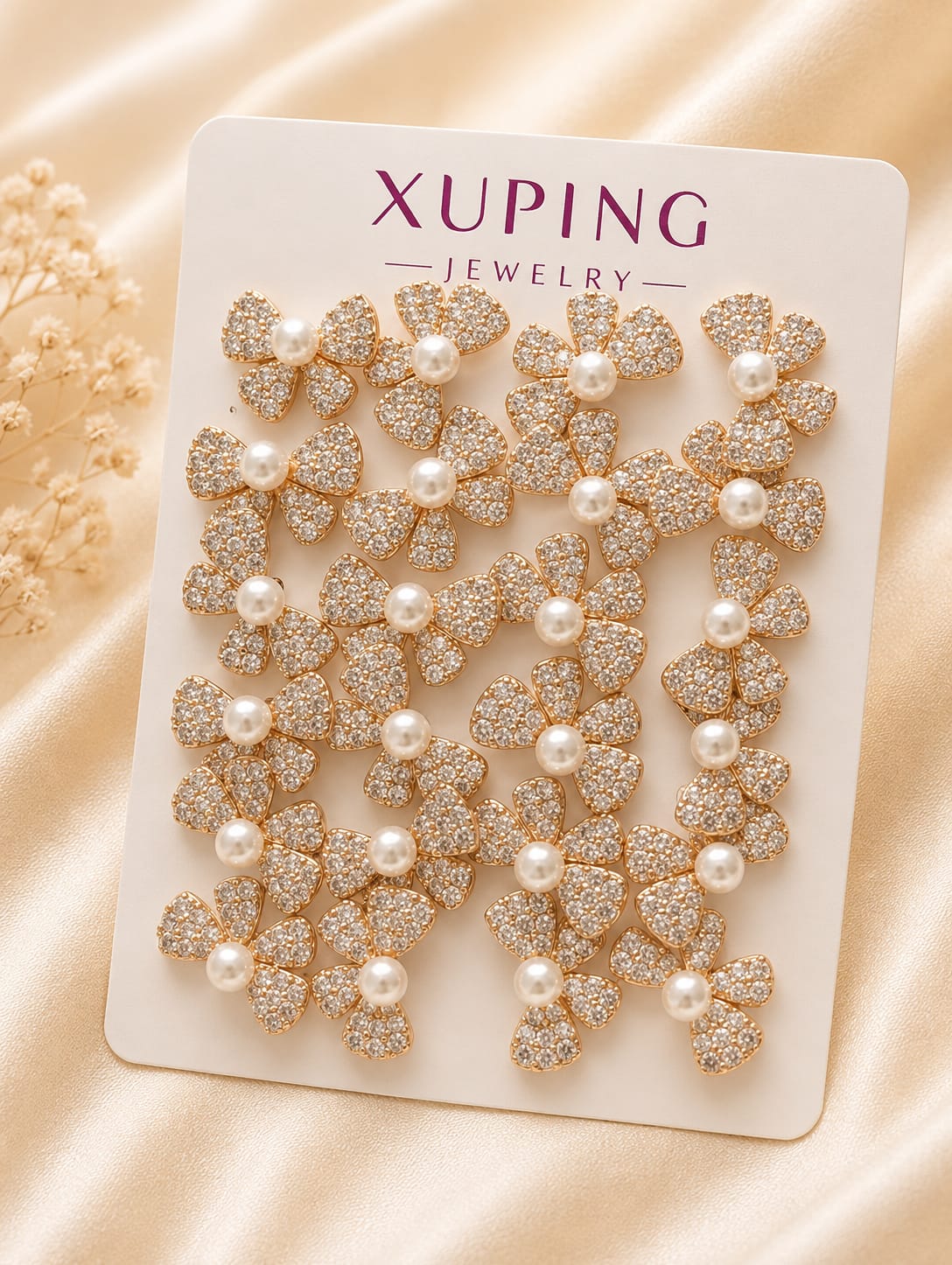 Bow and crystal stud