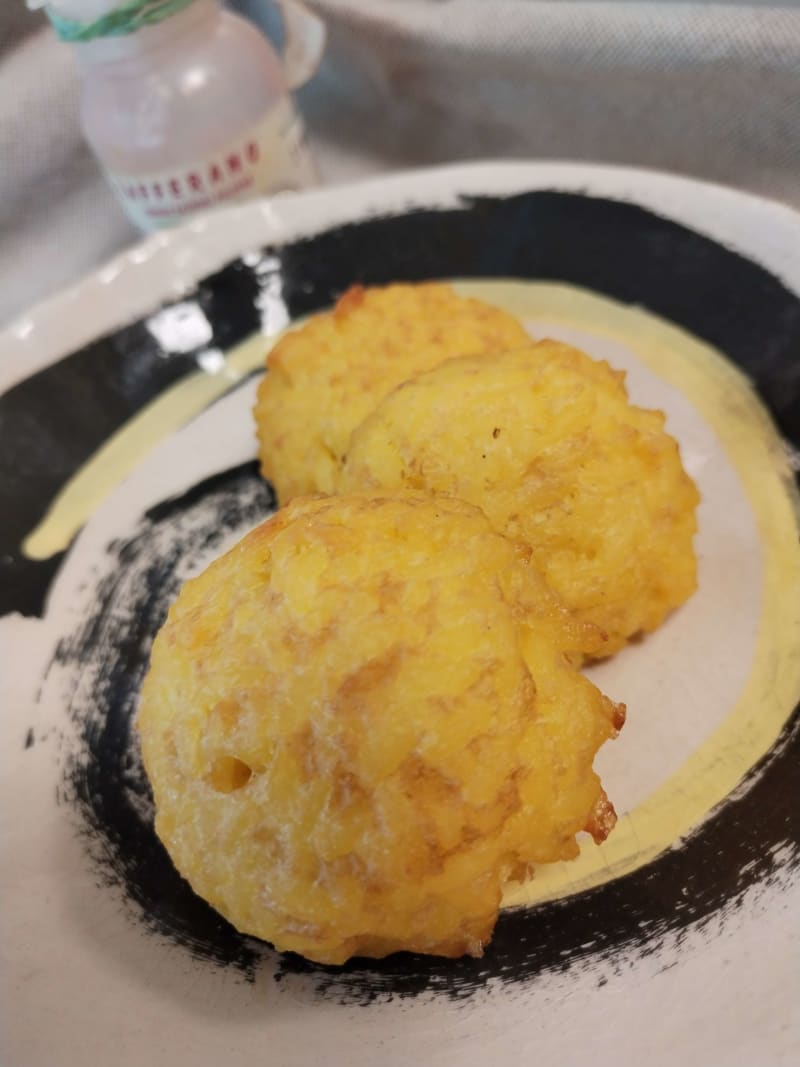 Riso giallo e parmigiano. Cotte in forno e senza glutine