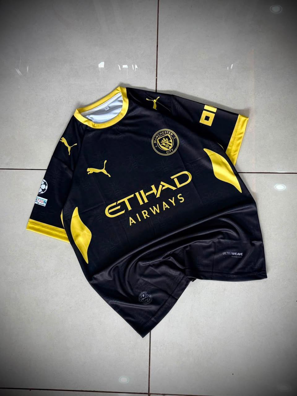 Manchester City 24/25 Away Kit (Black & Gold / Neon) — Haaland #9