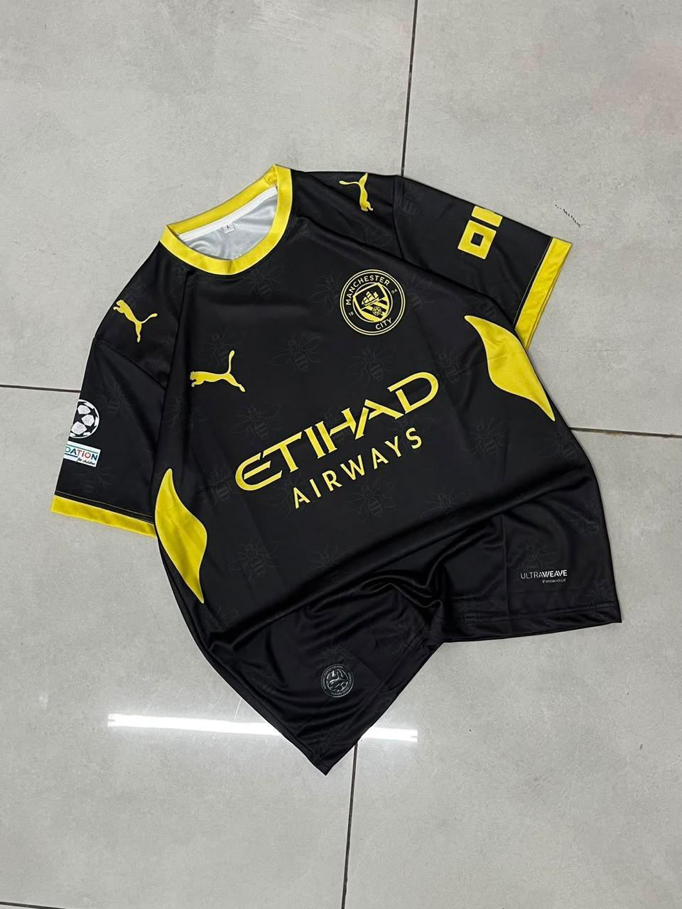 Manchester City 24/25 Away Kit (Black & Gold / Neon) — Cherki #10