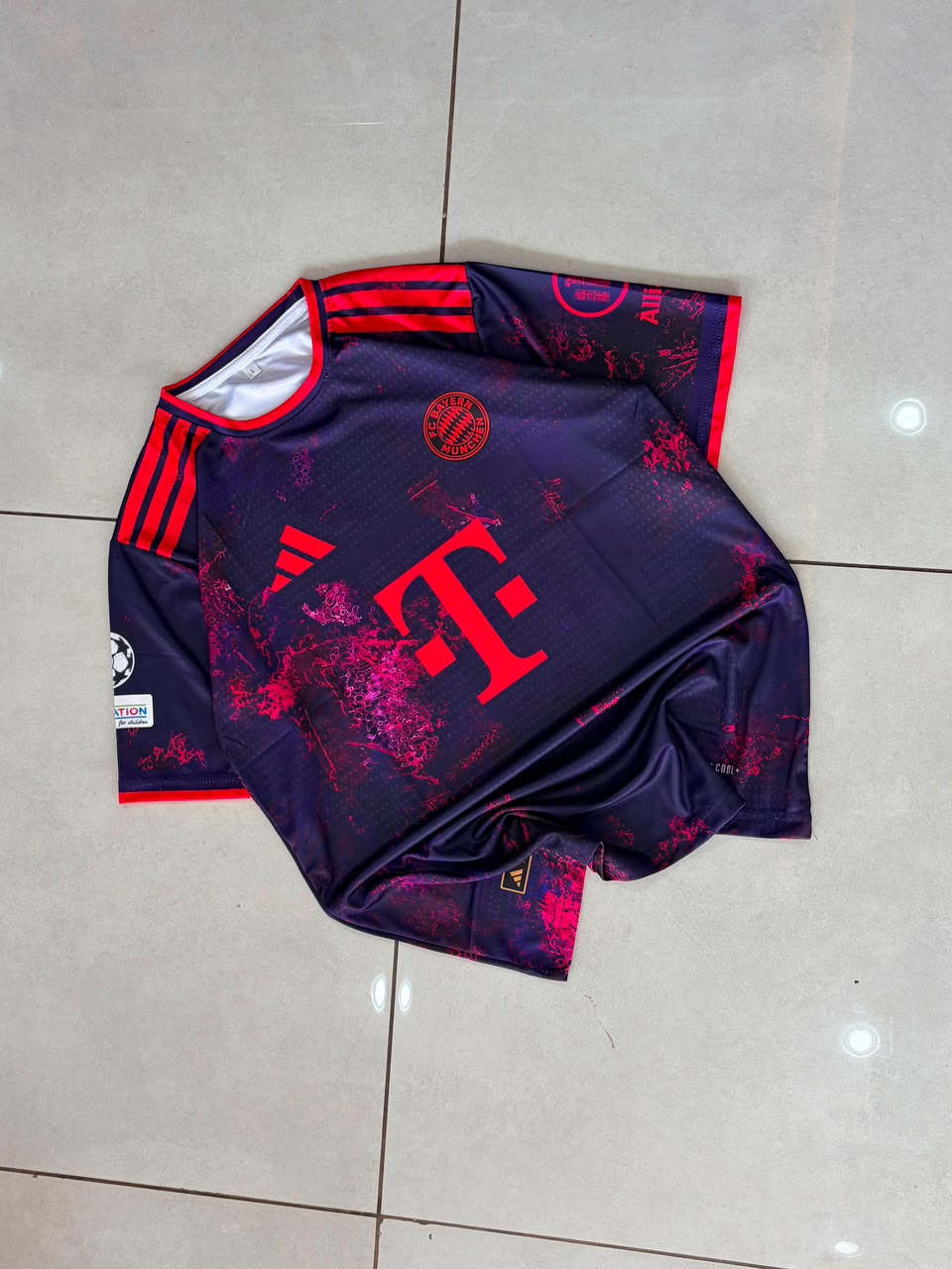 FC Bayern Munich 24/25 Away Kit (Dark Purple / Neon Graphic) — Musiala #10