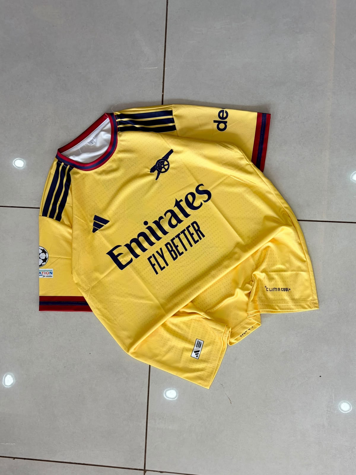 Arsenal FC 24/25 Away Kit (Sun Yellow) — Saka #7