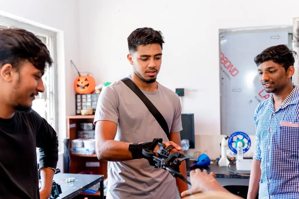 Working with a camera at the Red Lotus Films workshop, DreamSpace Academy Batticaloa, 2024-01-31.