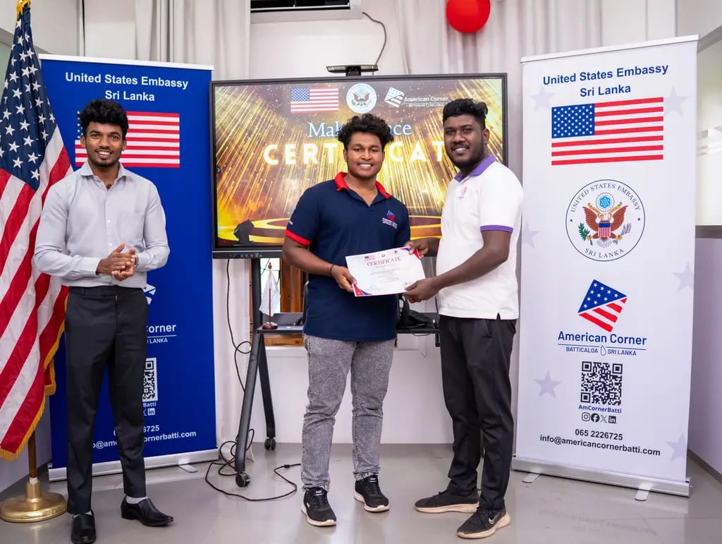 Handing out certificates at the 3D printing workshop, Batticaloa, April 2026.