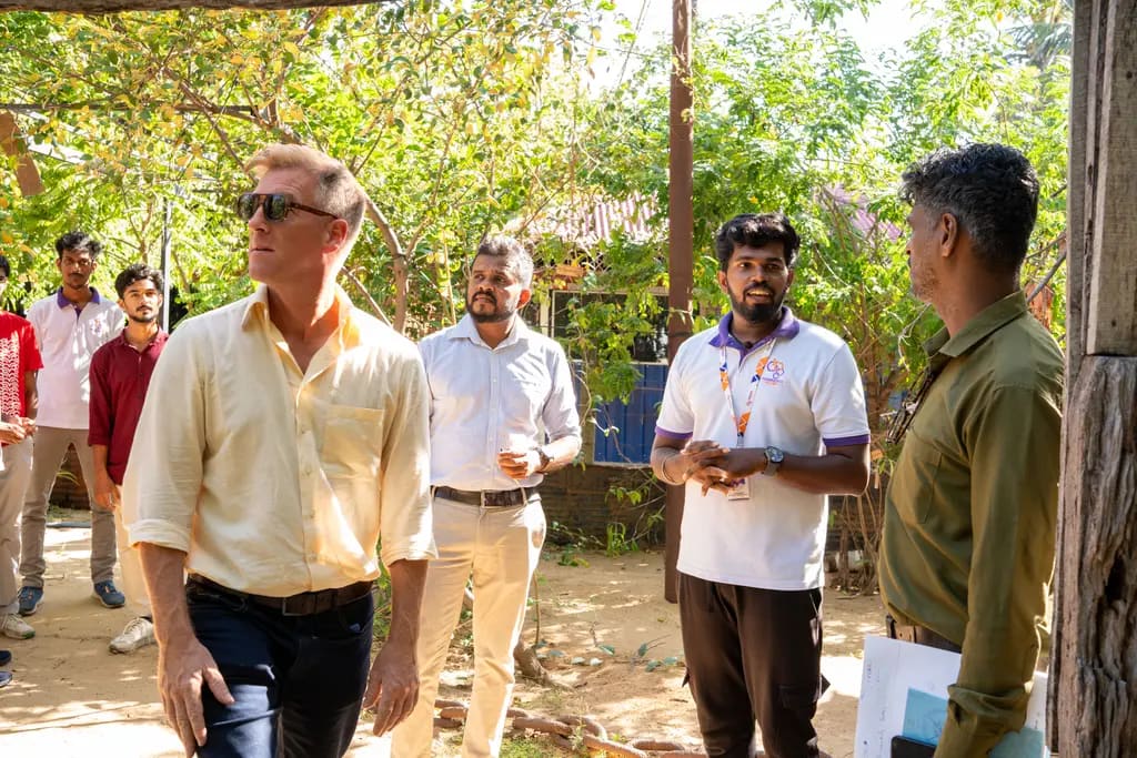 Outside with the ACTED visitors, DreamSpace Academy Batticaloa, July 2026.
