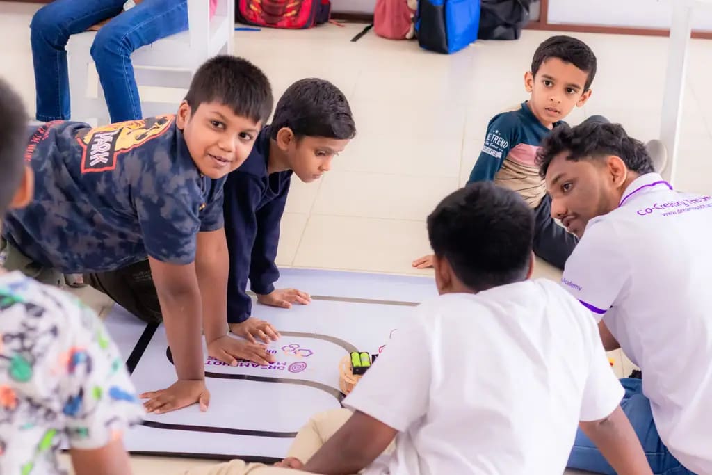 Testing the cars on the track, DreamSpace Academy Batticaloa, August 2025.
