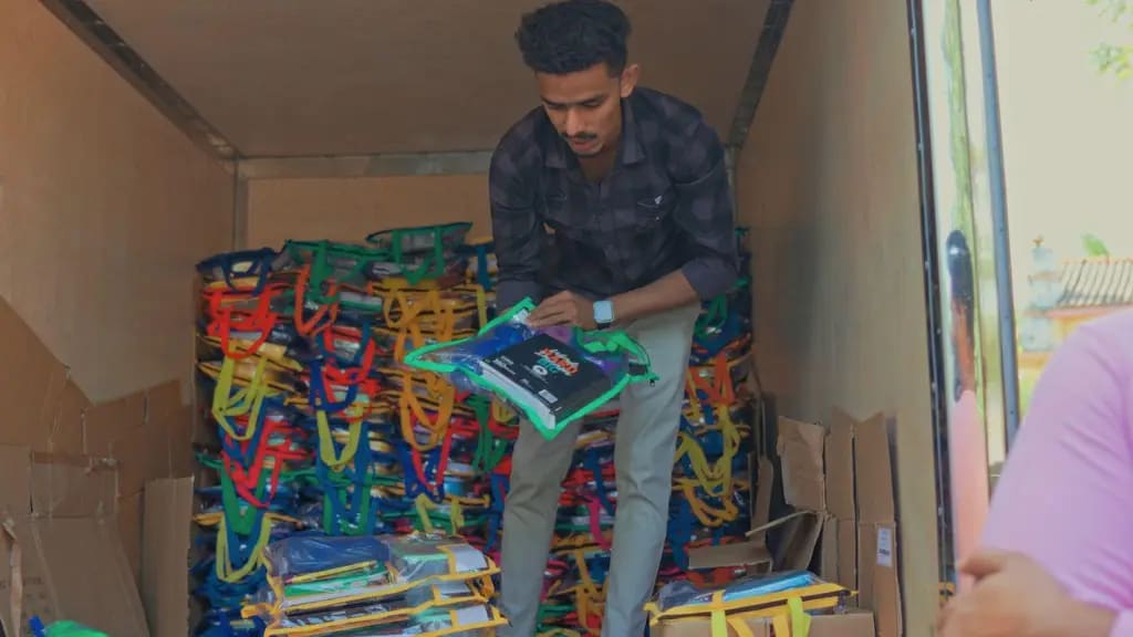 Unloading the school supply packs, Al Madeena Primary School, Polonnaruwa, December 2025.