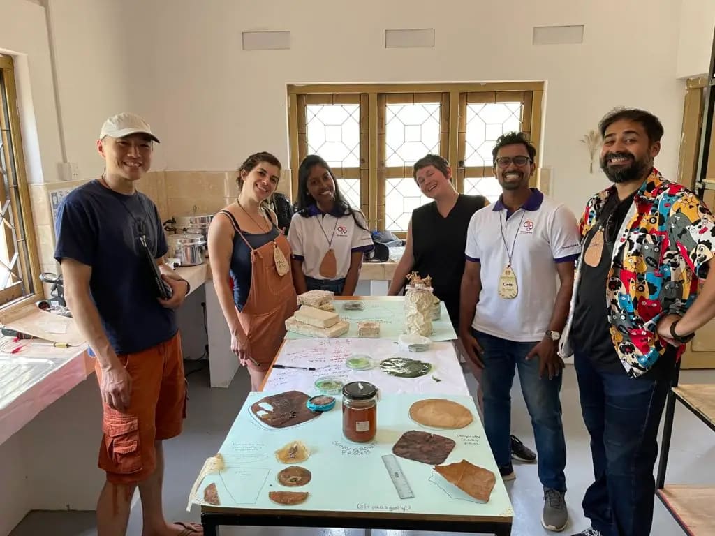 Dinacon delegates and the team in the Bio Lab with mycelium samples, July 2022. Photo: Dinacon 2022.