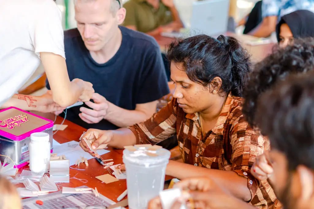The coptic bookbinding workshop, July 2022. Photo: Dinacon 2022.