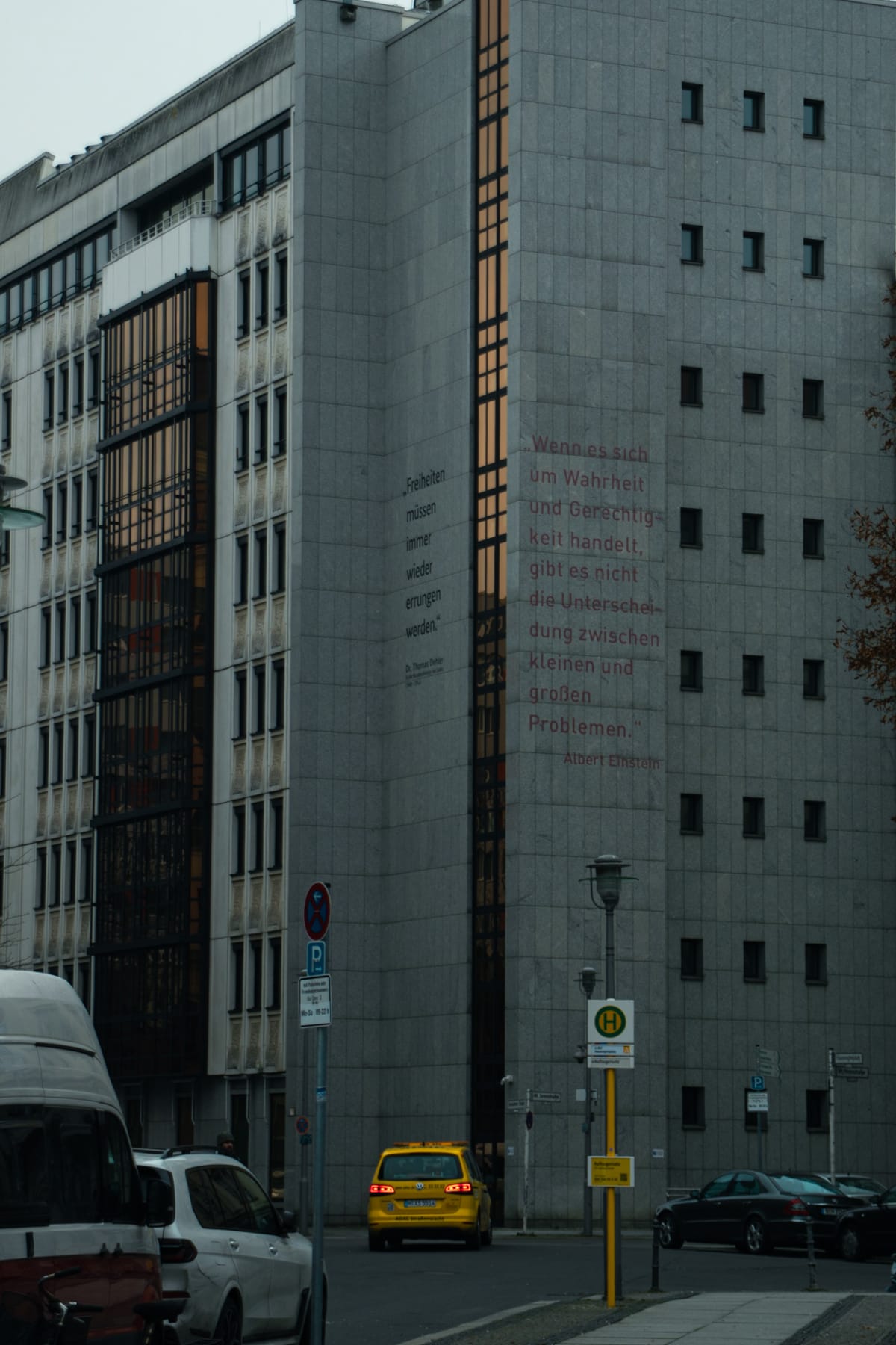 Modern Berlin office buildings beside a quiet city street